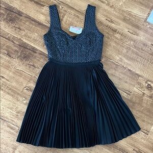 Black Pleated Dress with Geometric Pattern